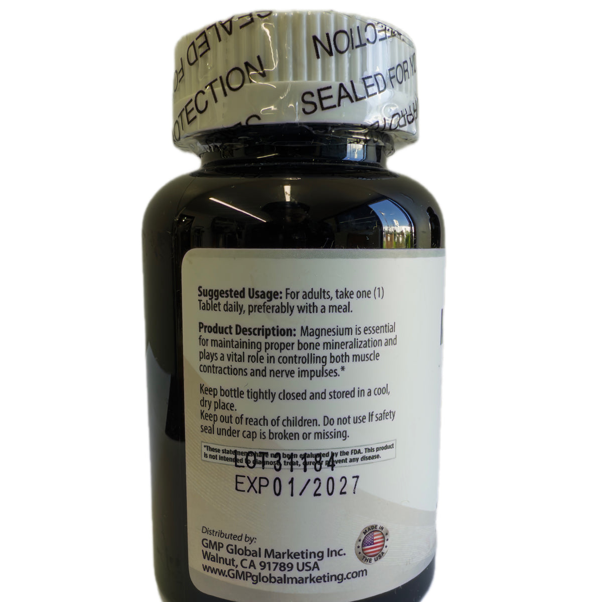 Frasco de citrato de magnesio, vista trasera con Supplement Facts